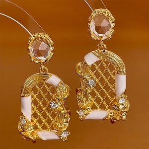 Elegant Gold and White Earrings